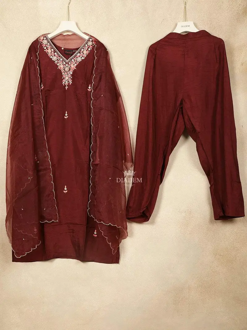 Maroon Crepe Straight Cut Salwar Suit For Girls Adorned With Thread Work And Flower Design, Paired With Dupatta 1