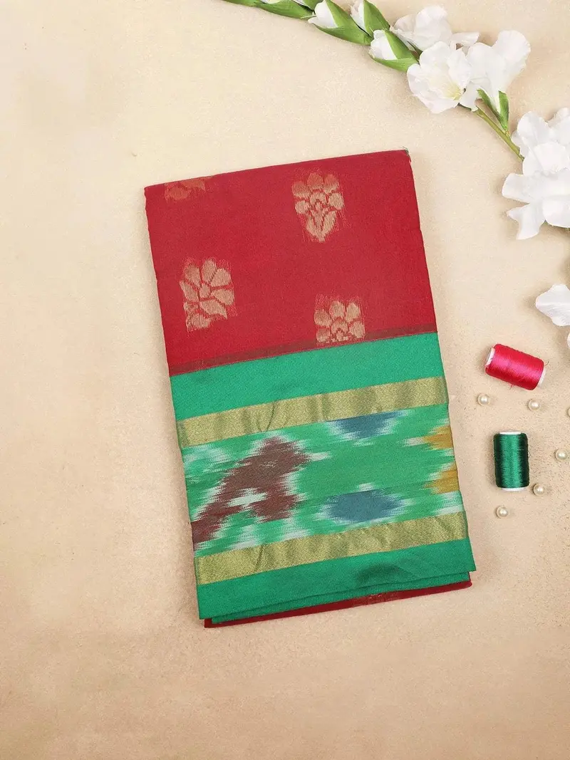 Maroon Silk Cotton Saree With Floral Design On The Body With Ikat Designed Border 1
