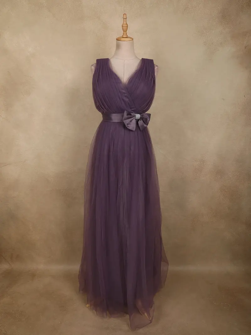 Mauve Purple Pleated Design With Bow Embellishment Net Party Wear Gown 1