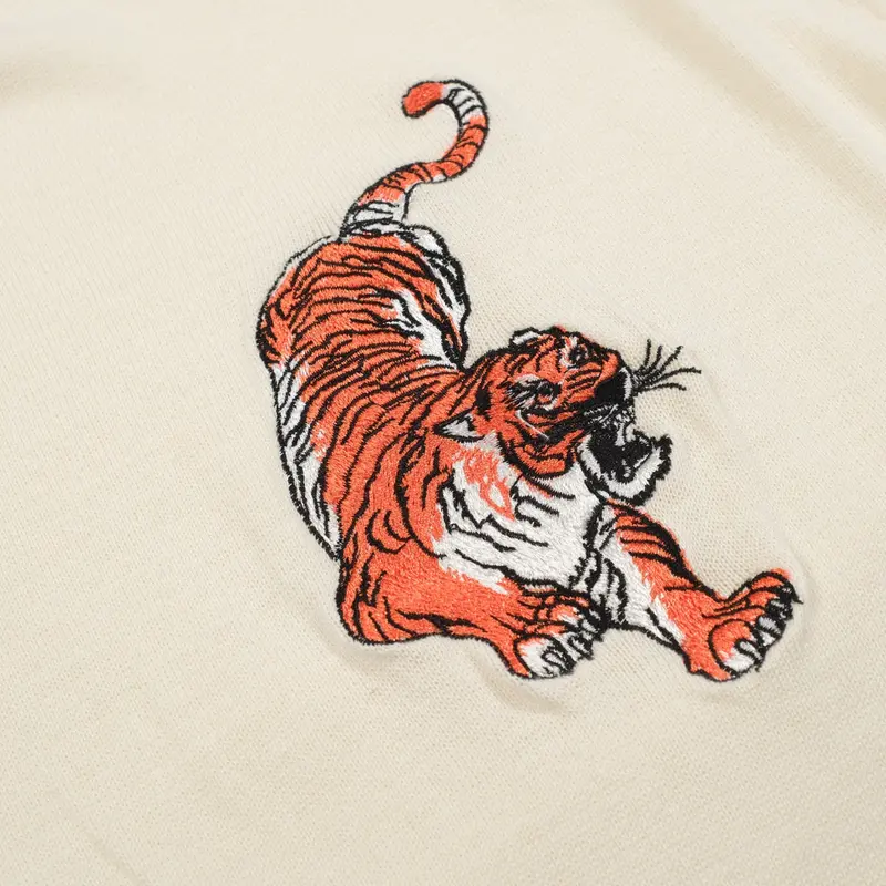 Men’S Cream Knitwear – Embroidered Animal With Orange Trim 2