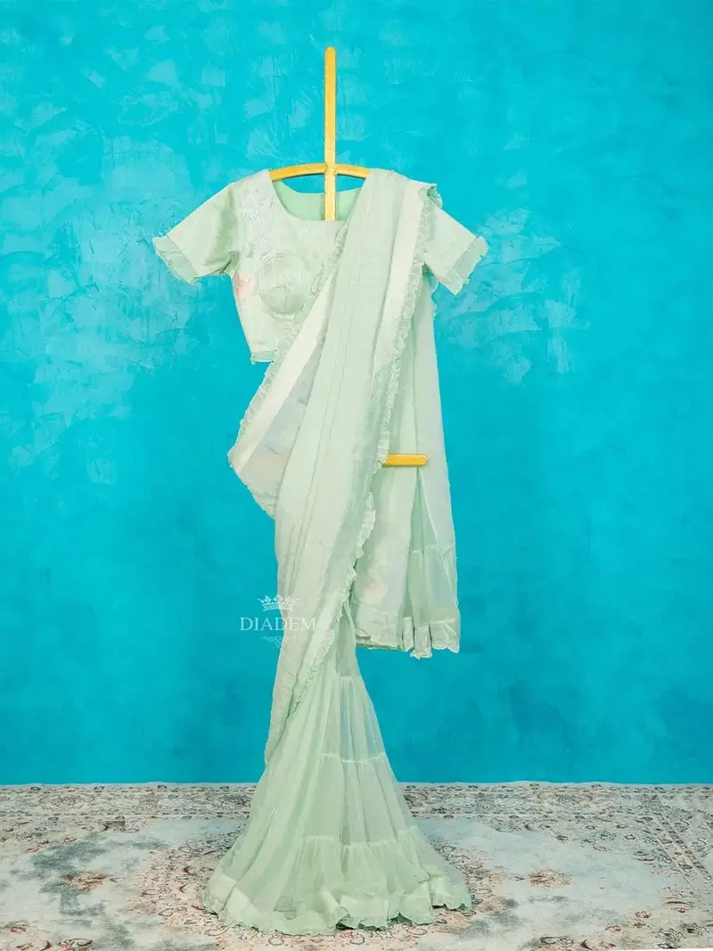 Mint Chiffon Ruffle Saree Adorned With Floral Thread Work Along With Ruffle Blouse 1