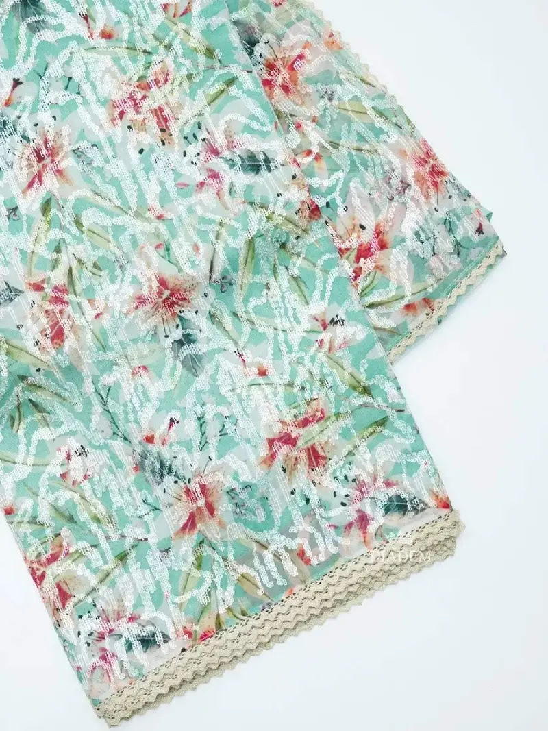 Mint Green Organza Silk Saree Adorned In Floral Prints And Sequins 1