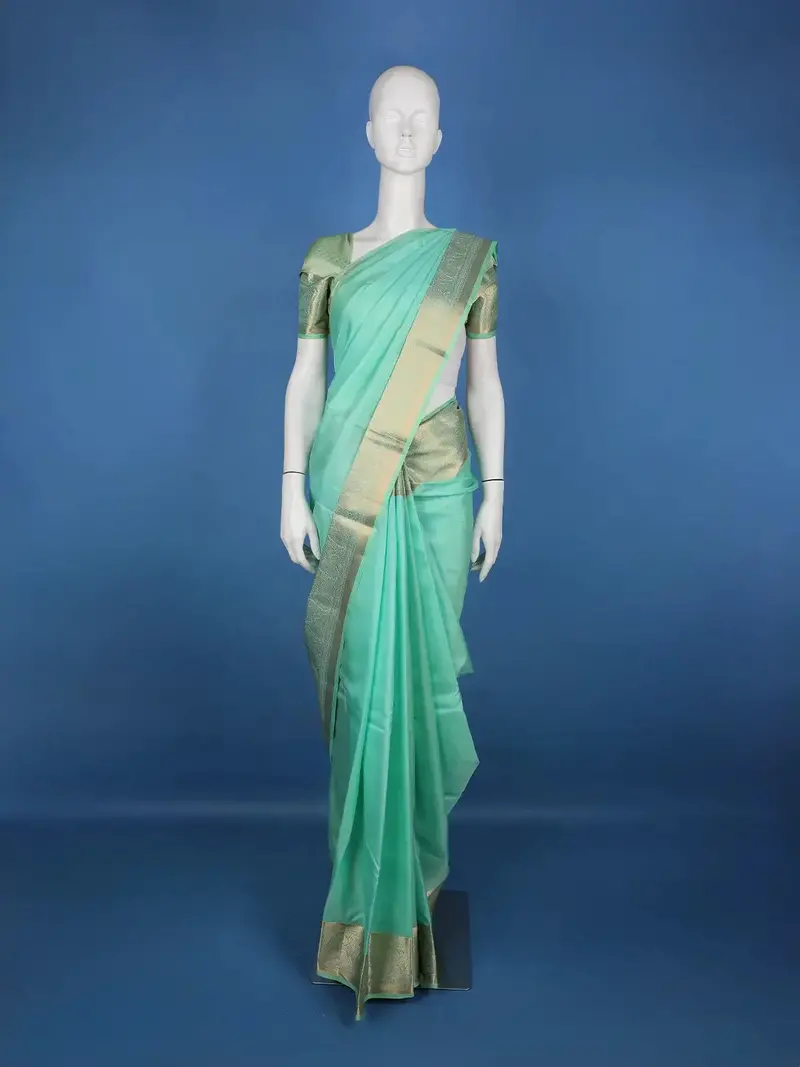 Mint Green Solid Design Woven Zari Border Silk Saree 1