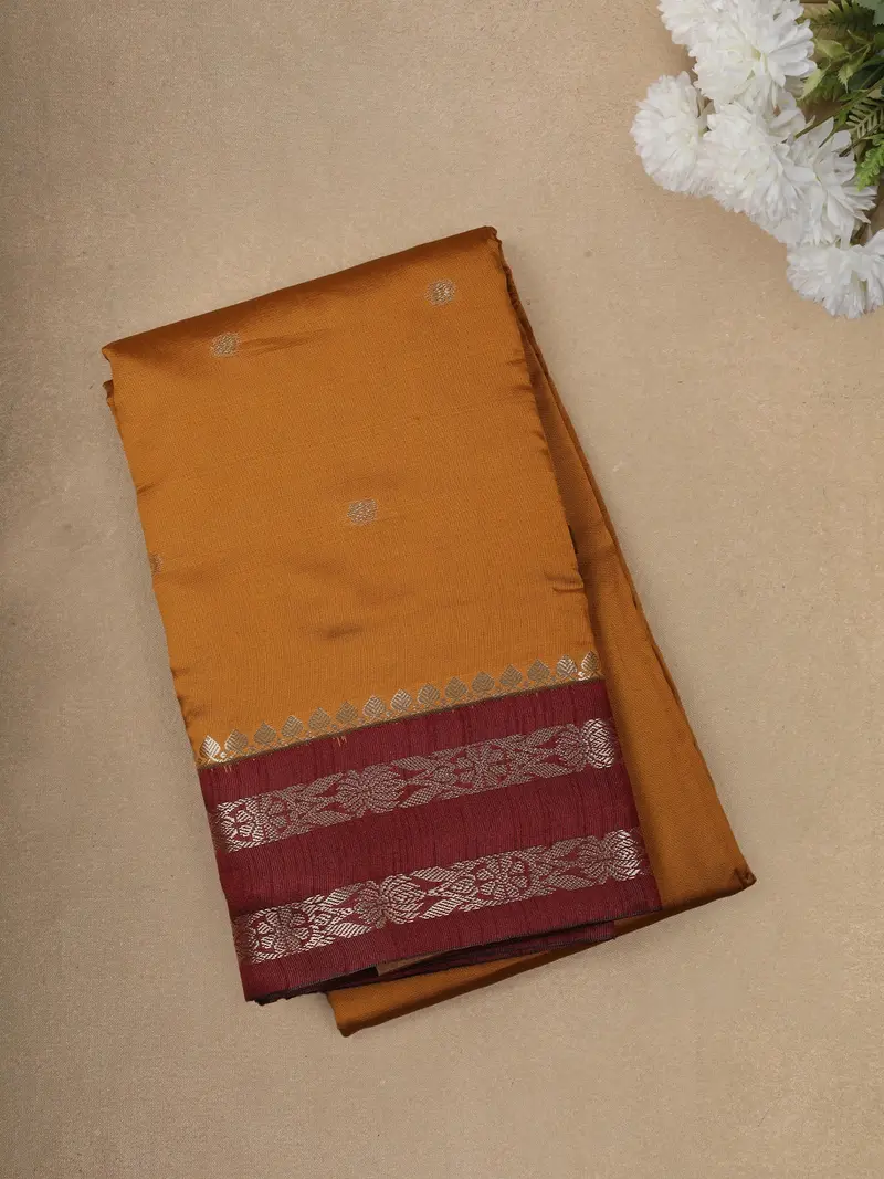 Mustard Yellow Butta Zari Woven Design Semi Silk Fancy Wear Saree With Contrast Border 1
