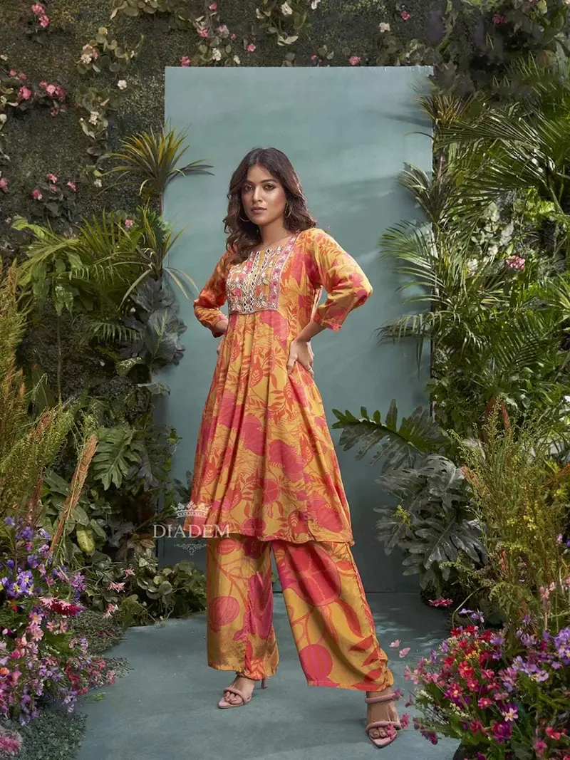 Mustard Yellow Crepe Palazzo Salwar Suit Adorned With Floral Prints And Beads 1