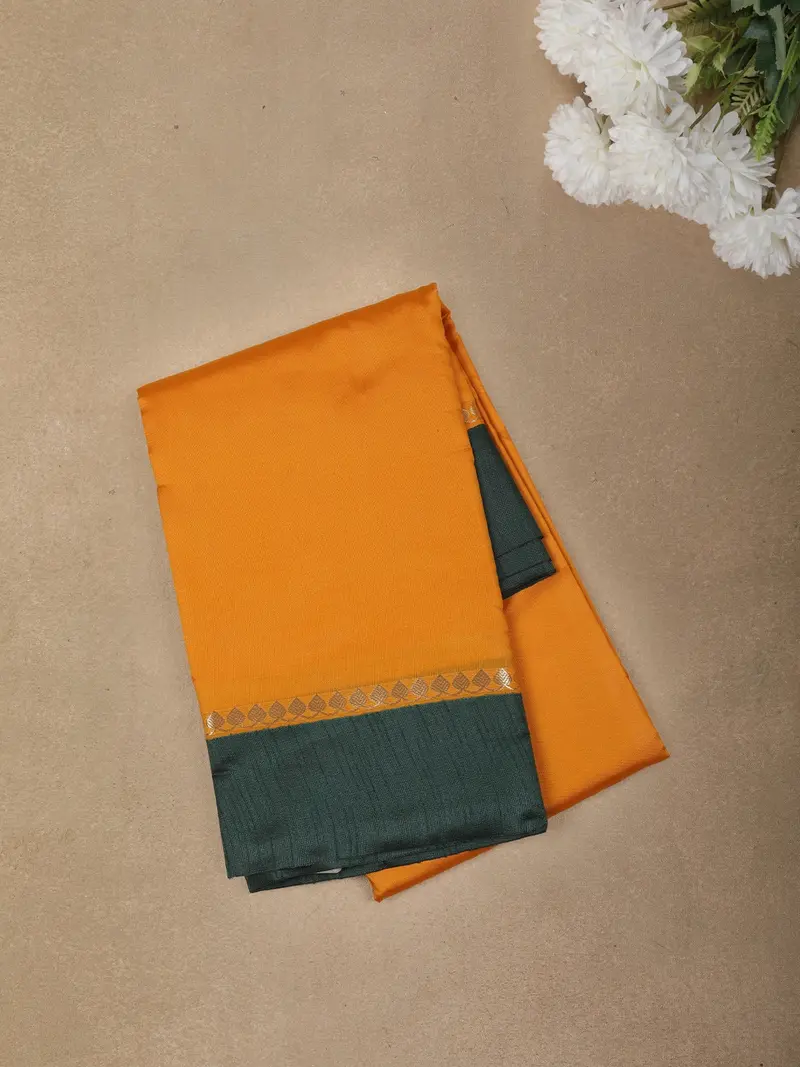 Mustard Yellow Solid Design Semi Silk Fancy Saree With Contrast Zari Border 1