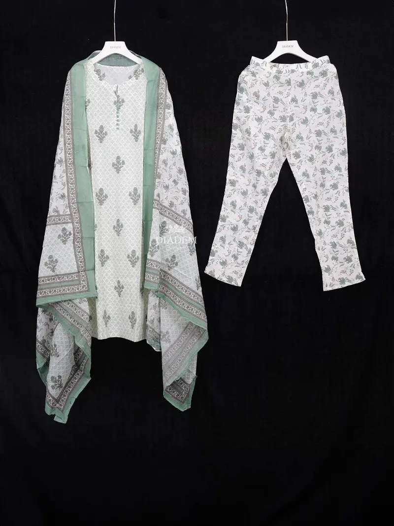 Off White And Green Cotton Straight Cut Salwar Suit Adorned With Floral Prints Paired With Dupatta 1
