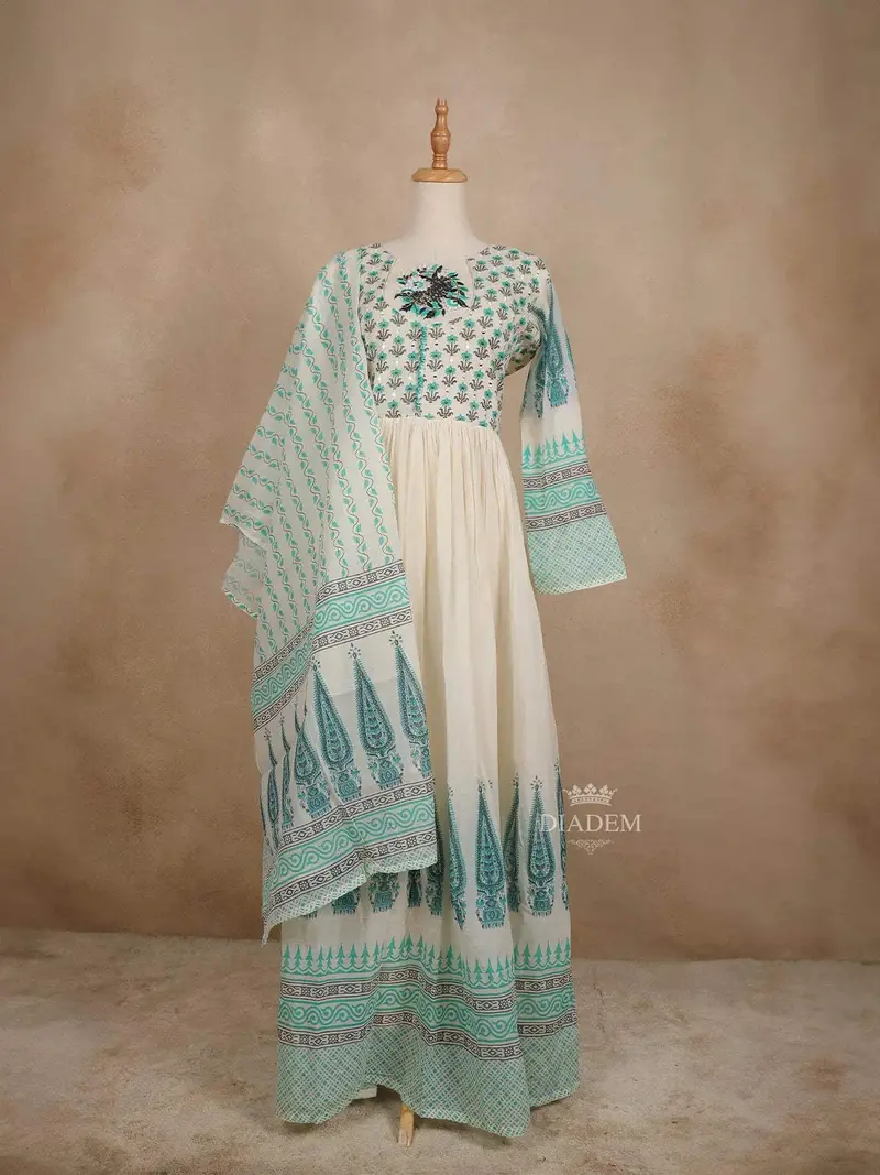 Off White Cotton Straight Cut Salwar Suit For Women Adorned With Sequins And Flower Designs Paired With Dupatta 1