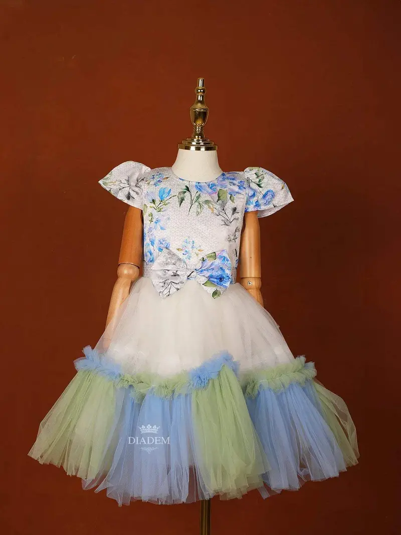 Off White Satin With Net Frock Adorned With Floral Prints And Attached Bow 1