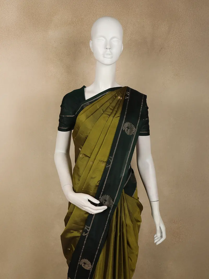 Olive Green Butta Woven Design Soft Silk Fancy Saree With Contrast Peacock Zari Border 2