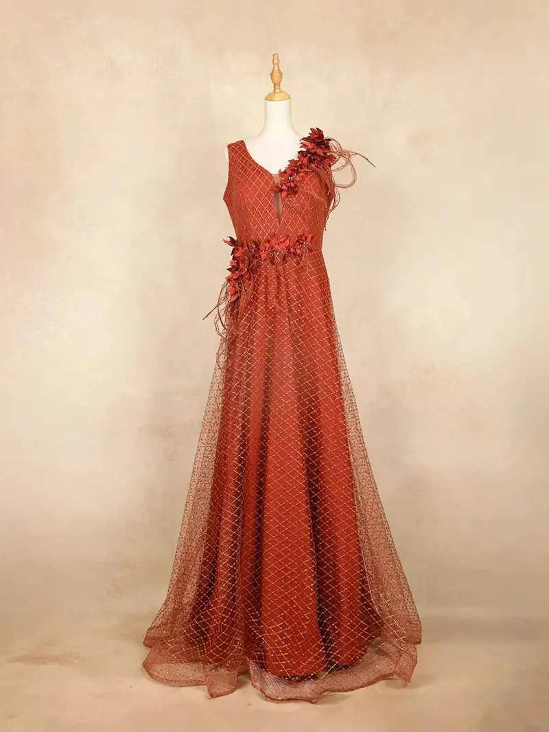 Orange Net With Criss Cross Design, 3D Flowers And Stones Gown 1