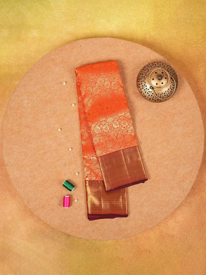 Orange Pure Kanchipuram Silk Saree With Floral Patterns On The Body And With Contrast Designed Border 1