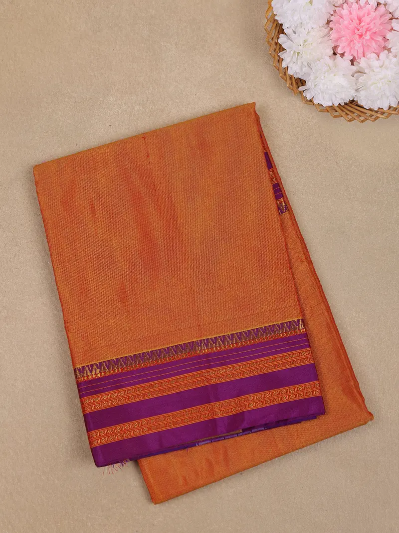 Orange Solid Design Semi Silk Cotton Saree With Contrast Purple Border 1