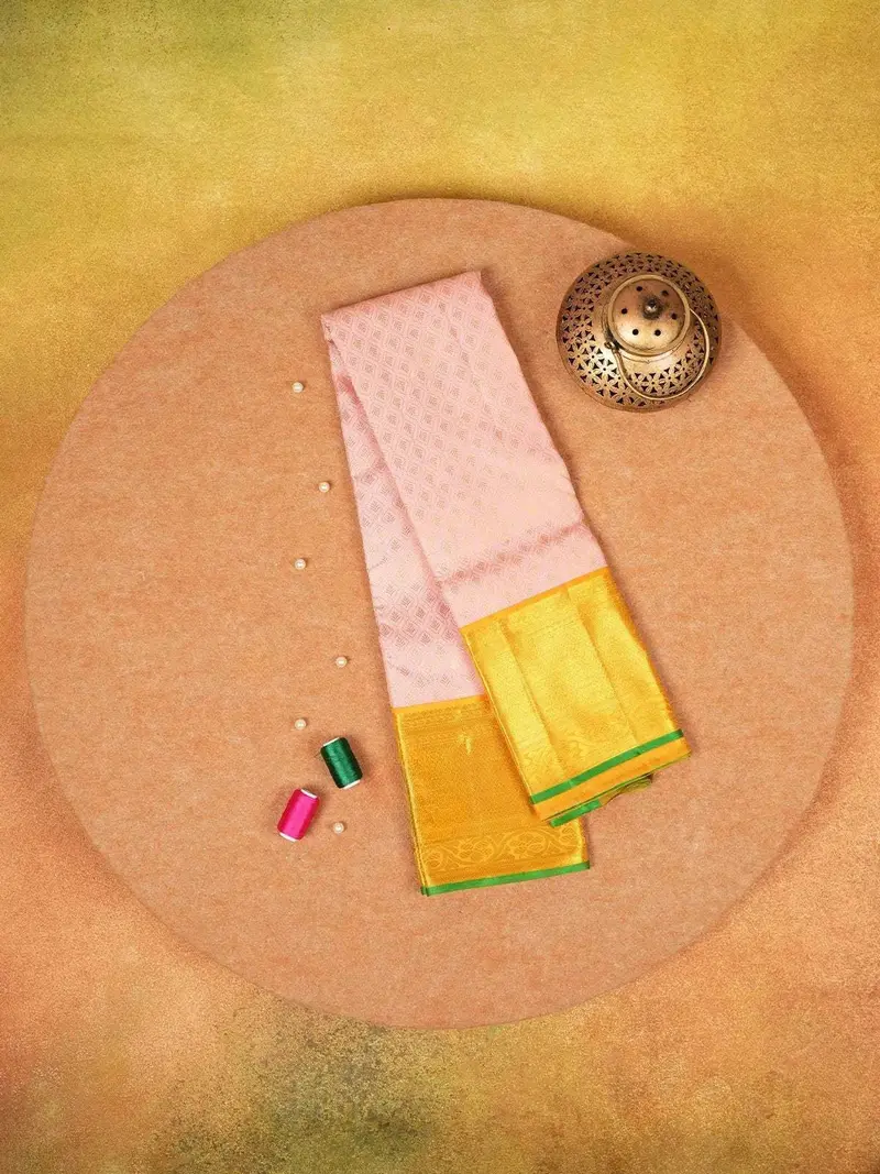 Pale Pink Pure Kanchipuram Silk Saree With Leaf Designs On The Body And With Contrast Border 1