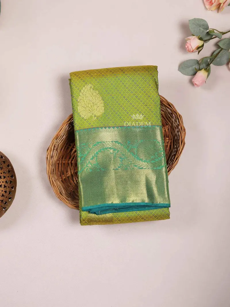 Parrot Green Pure Kanchipuram Bridal Silk Saree With Leaf Motif On The Body And Contrast Zari Border 1