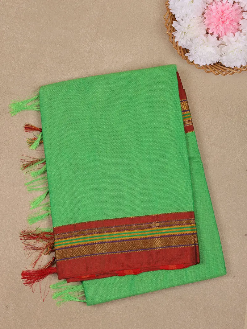 Parrot Green Solid Design Semi Silk Cotton Saree With Contrast Border 1