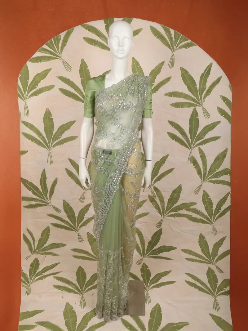 Pastel Mint Green Heavy Sequins And Silver Zardozi Embroidered Design Net Fancy Saree With Scalloped Border 1