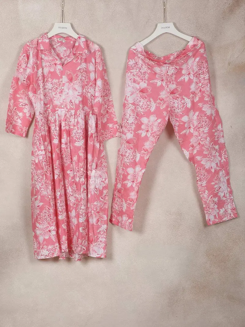 Peach Pink Crepe Straight Cut Salwar Suit Adorned With Floral Prints 1