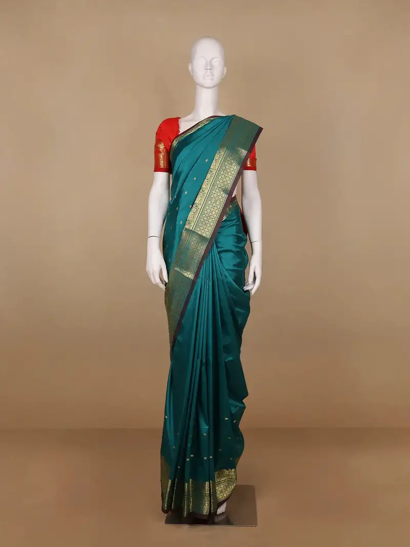Peacock Green Butta Design Zari Weaving Soft Silk Saree 1