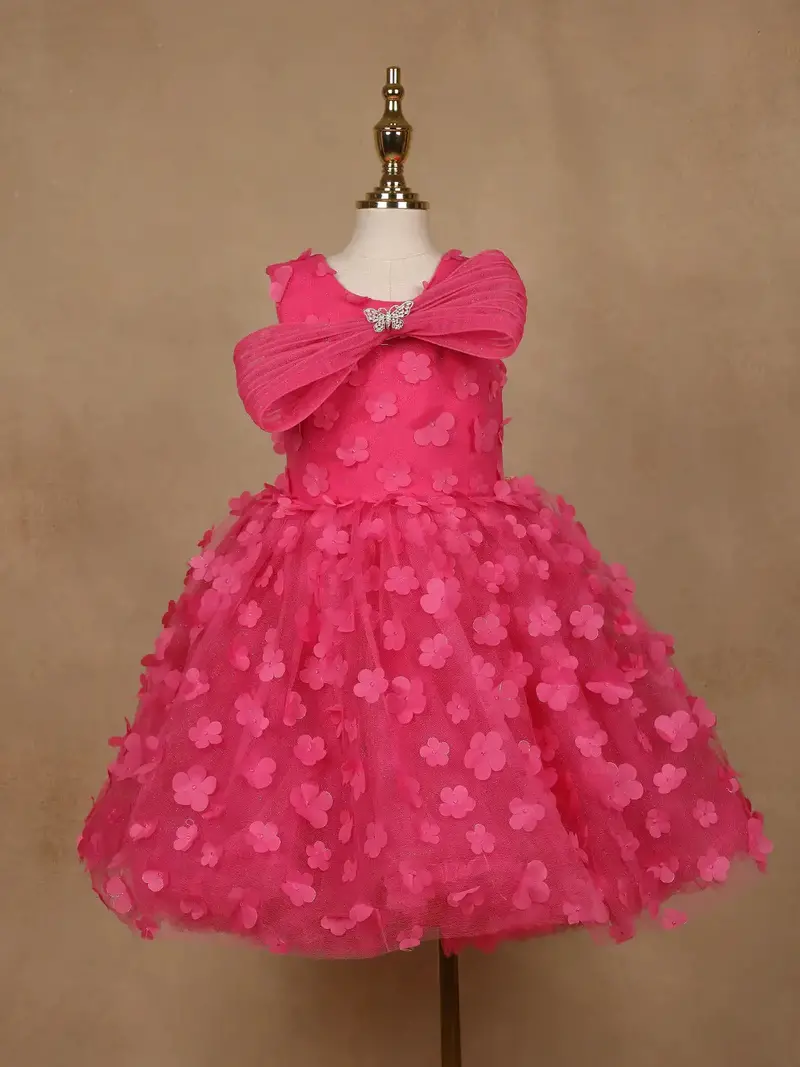 Pink 3D Floral Net Party Frock With Butterfly Brooch & Layered Bow 1