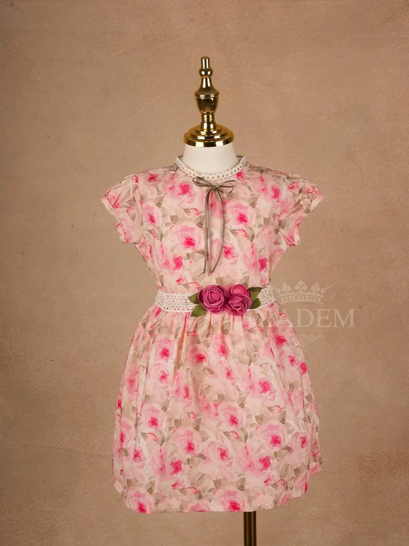 Pink Cotton Frock Adorned With Floral Designs And Bow For Girls 1