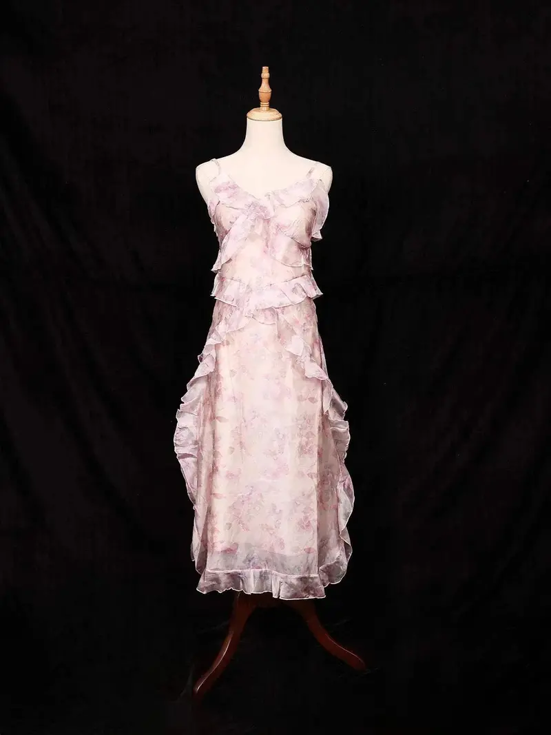 Pink Frock Adorned With Floral And Ruffled Design 1