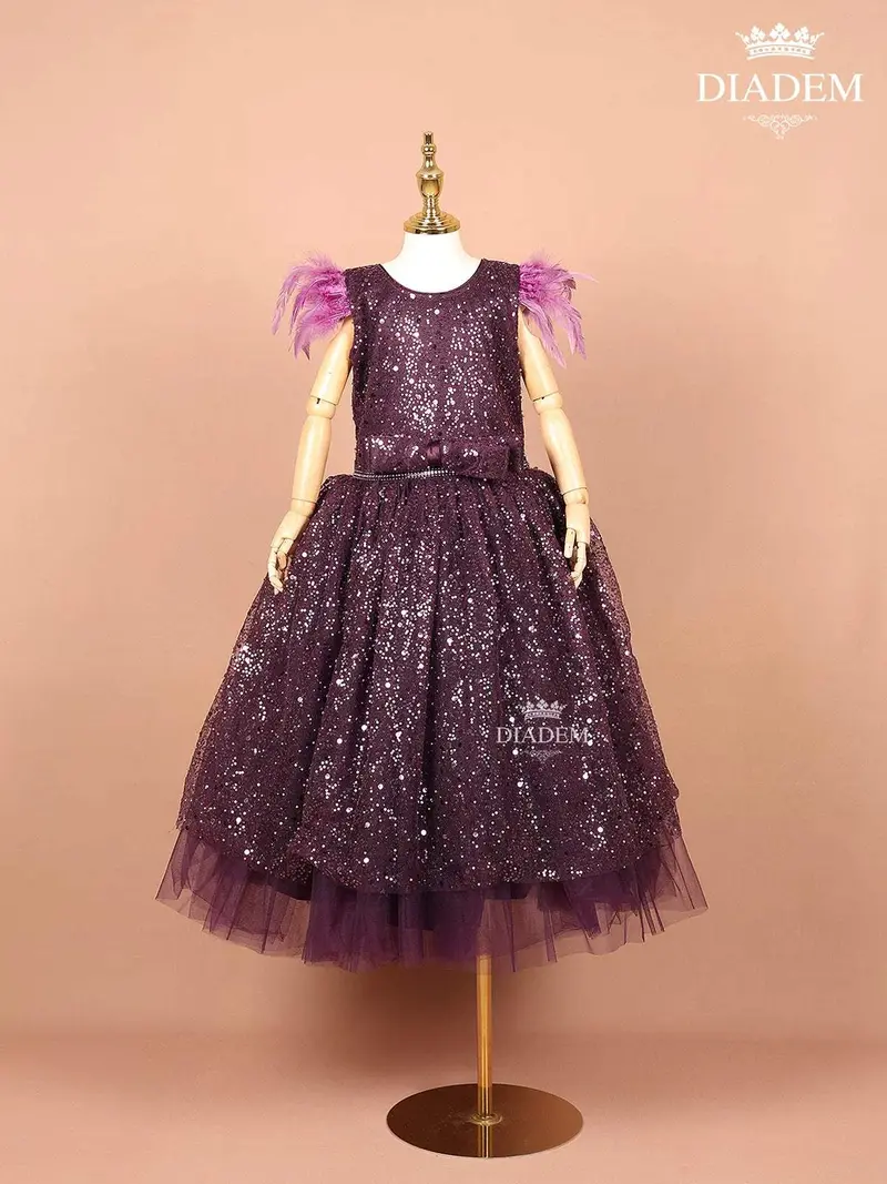 Purple Net Ball Gown Embellished With Sequins And An Attached Bow 1