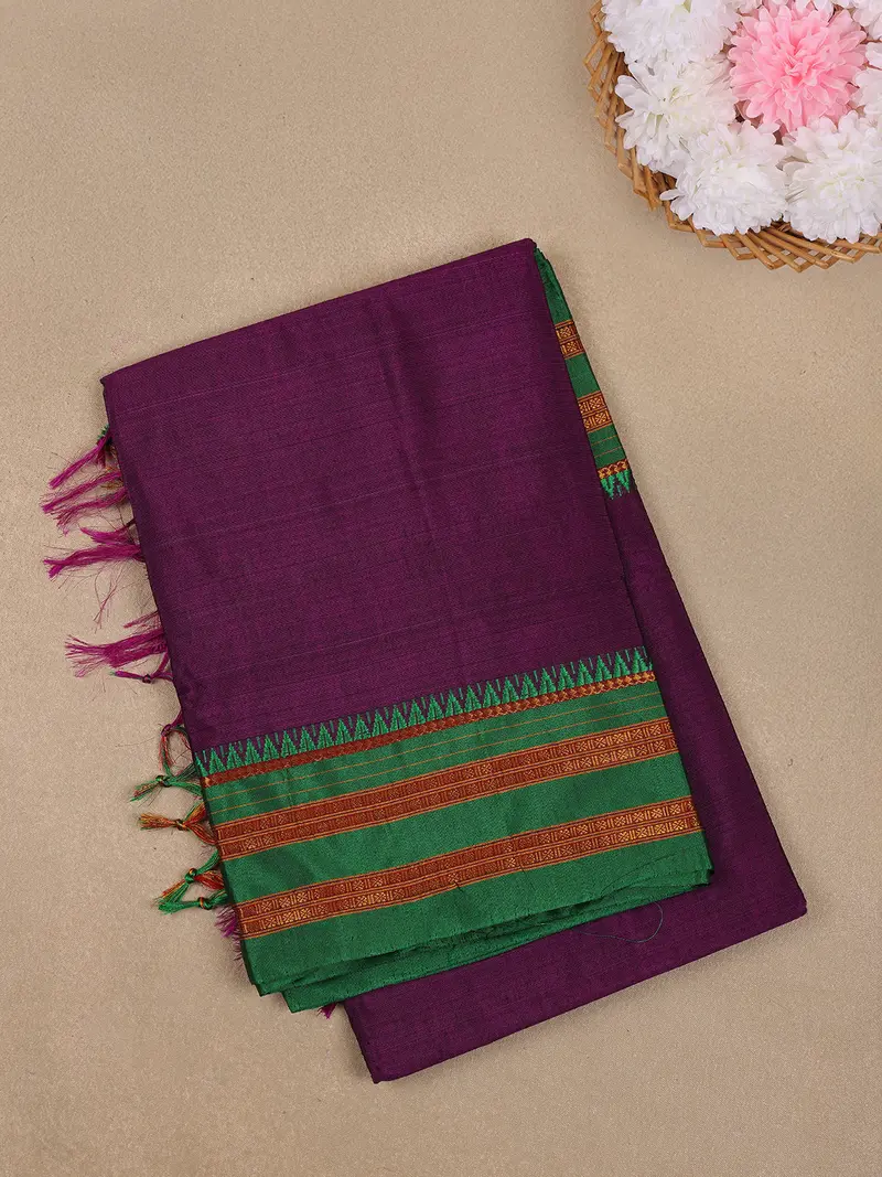 Purple Solid Design Semi Silk Cotton Saree With Contrast Green Border 1