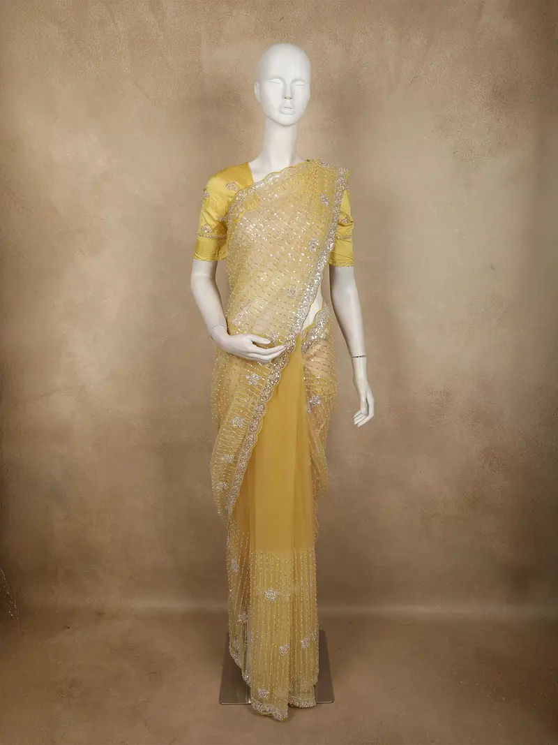 Radiant Marigold Yellow Floral Sequins And Beads Embroidered Design Net Designer Saree With Scalloped Border 1