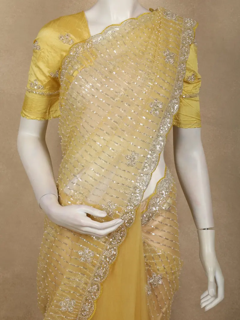 Radiant Marigold Yellow Floral Sequins And Beads Embroidered Design Net Designer Saree With Scalloped Border 2
