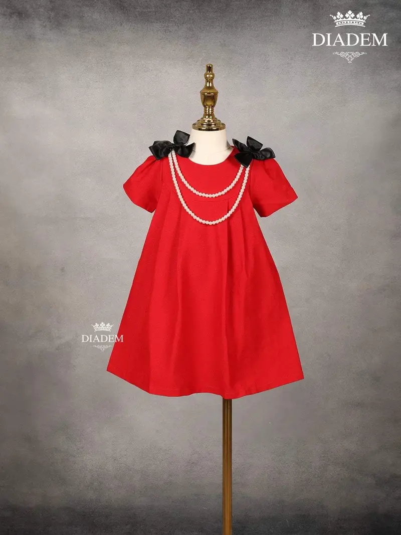 Red Denim Cotton Frock With Attached Bow And Beaded Mala 1