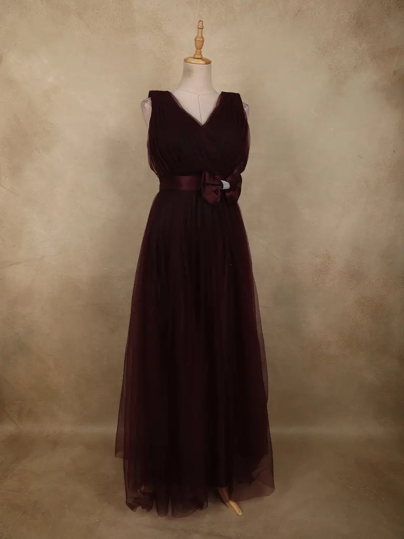 Rich Burgundy Pleated Design With Bow Embellishment Net Party Wear Gown 1