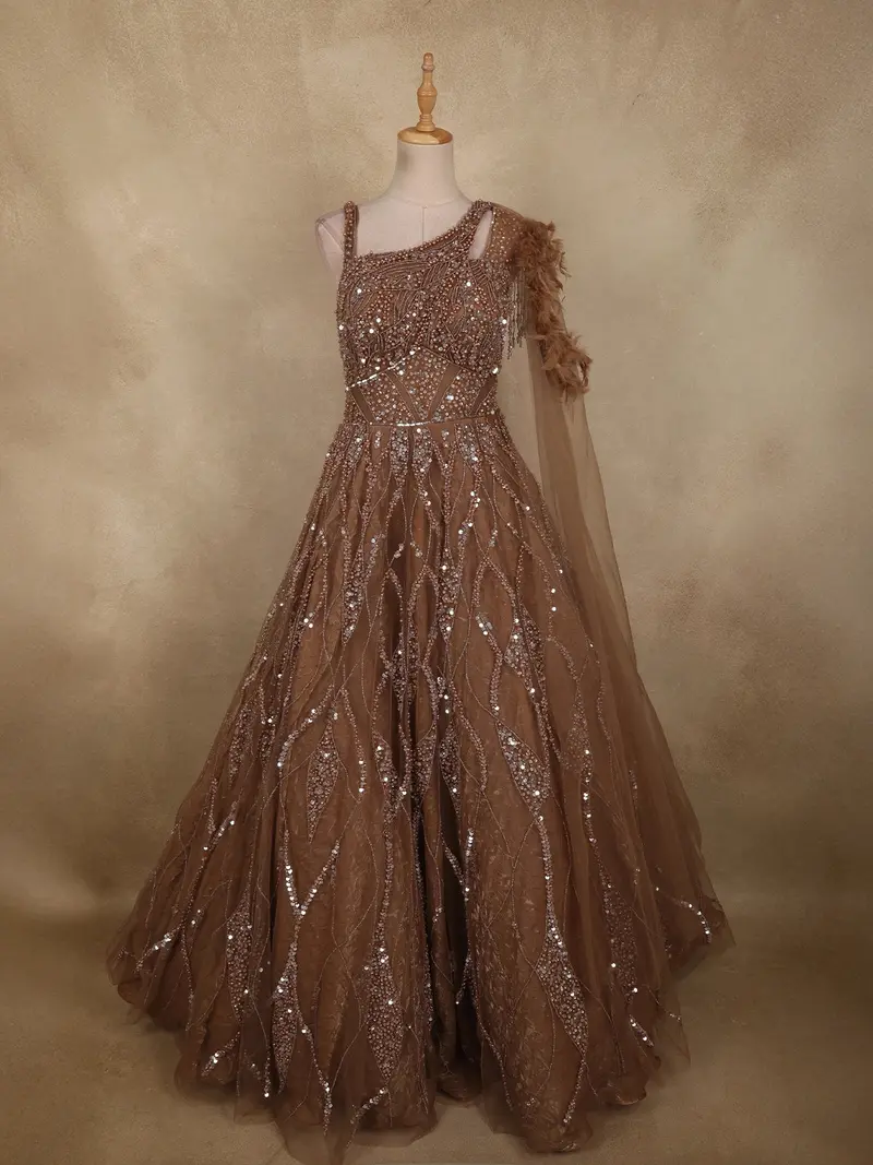 Rich Cocoa Brown Heavy Sequins And Beads Embroidered Design Net Party Wear Gown 1