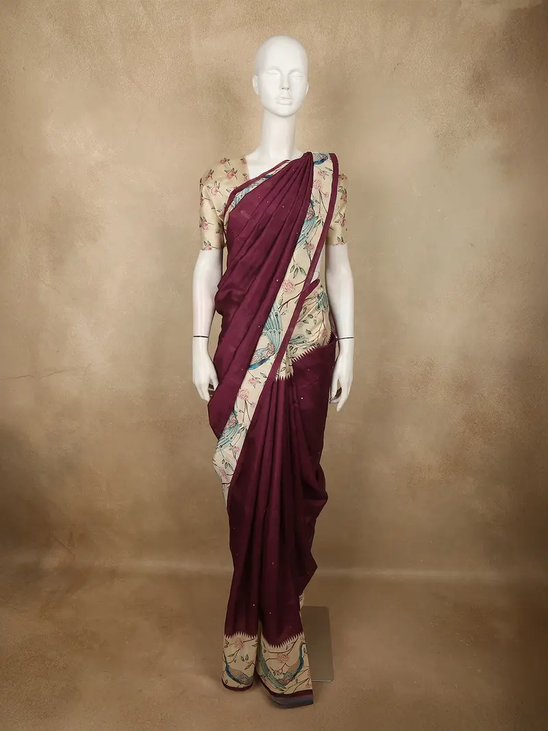Rich Wine Maroon Solid Design Semi Tussar Saree With Contrast Floral And Peacock Motif Border 1