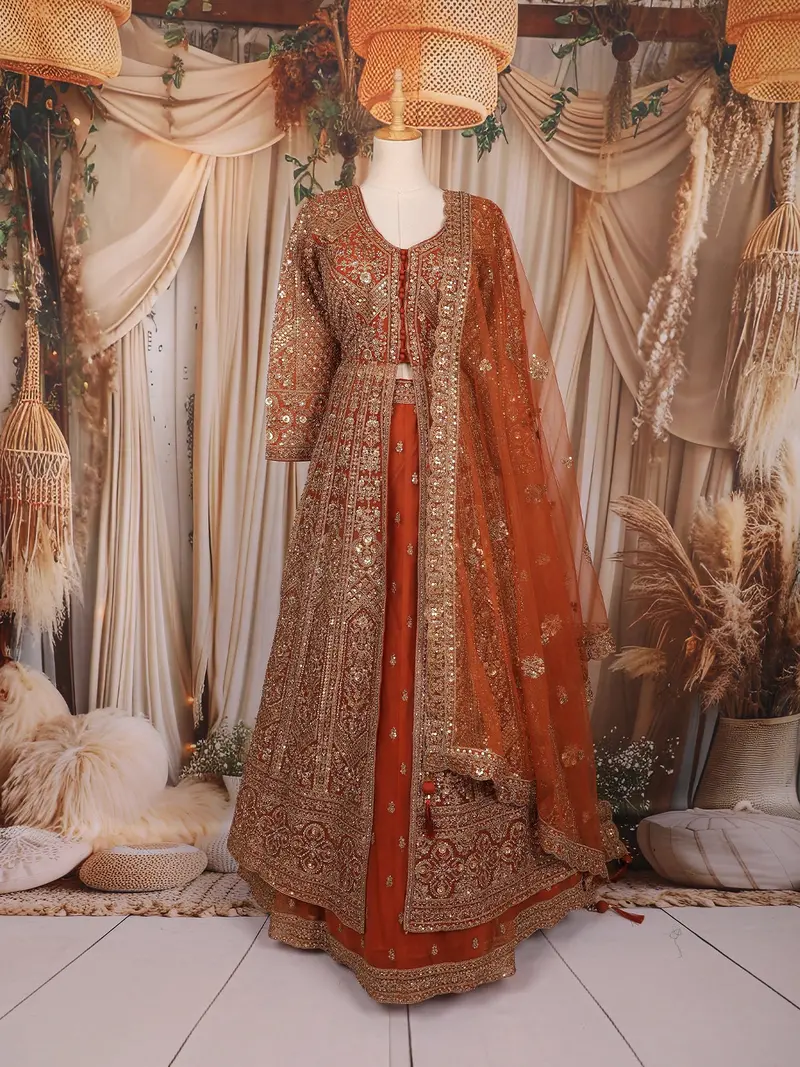 Rust Orange Heavy Sequins And Mirror Embroidered Design Net Mastani Lehenga With Long Jacket 1