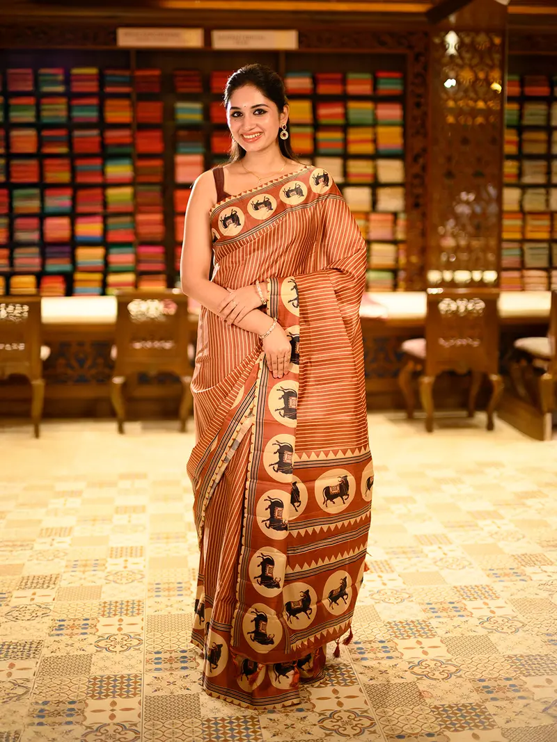 Rust Orange Striped Design Tussar Saree With Cow Motif Border 1