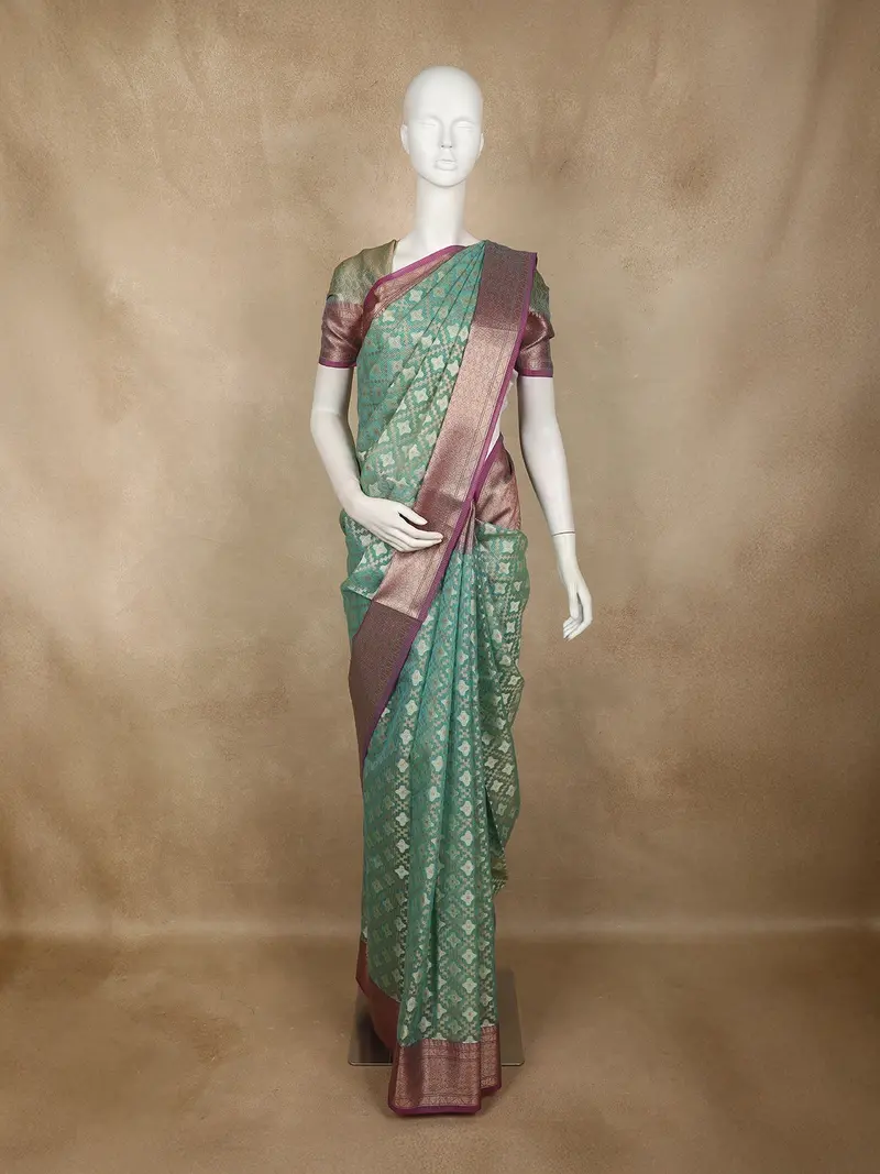 Sea Green Ikat Design Semi Banarasi Saree With Contrast Purple Zari Border 1