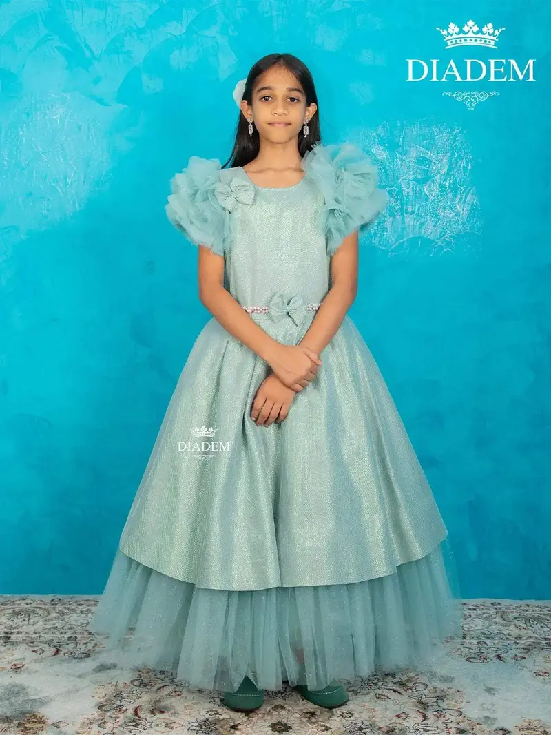 Sea Green Shimmer Net Ruffle Sleeve Gown With Bow Attached 1