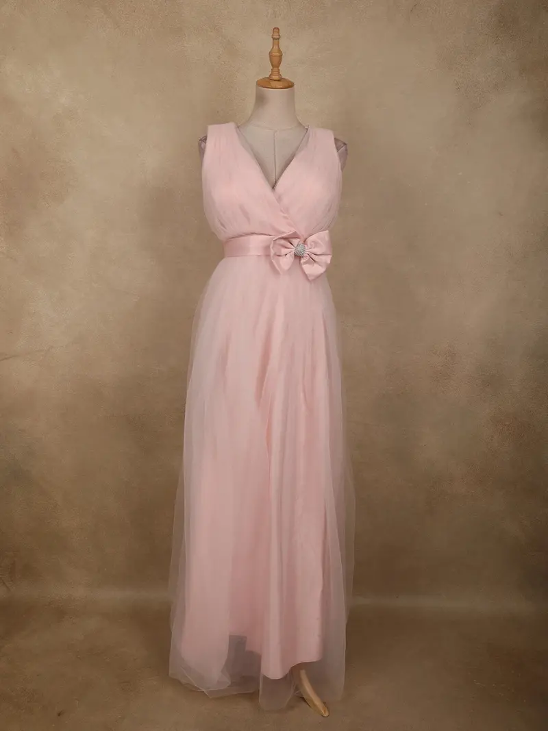 Soft Blush Pink Pleated Design With Bow Embellishment Net Party Wear Gown 1