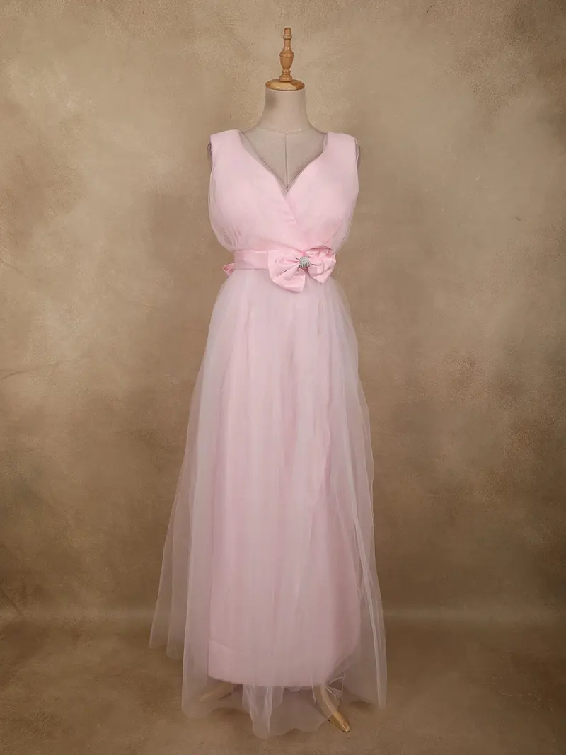 Soft Blush Pink Pleated Design With Bow Embellishment Net Party Wear Gown 1