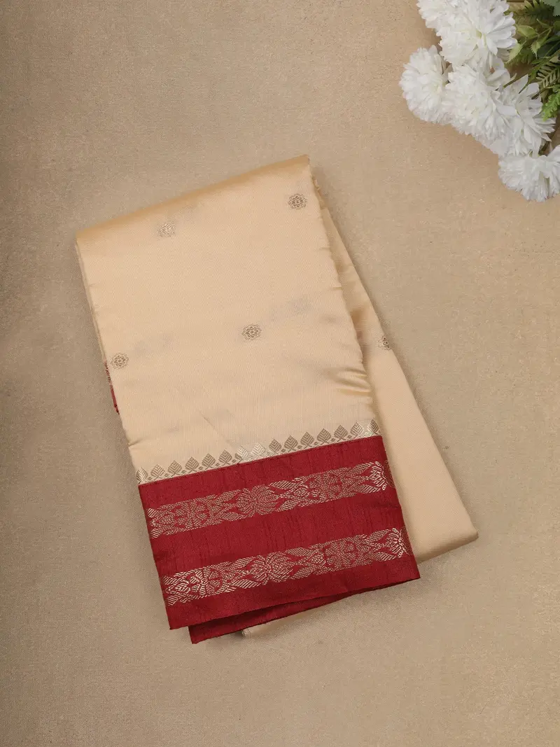 Soft Cream Butta Zari Woven Design Semi Silk Fancy Wear Saree With Contrast Border 1