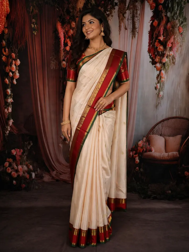 Soft Cream Paisley Butta Zari Woven Design Pure Kanchipuram Silk Saree With Multicolor Zari Border 1