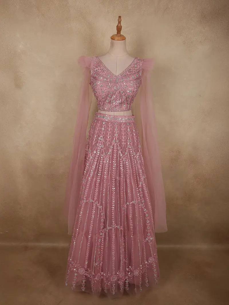 Soft Dusty Rose Pink Heavy Sequins Embroidered Design Net Lehenga Set With Cape Sleeves 1