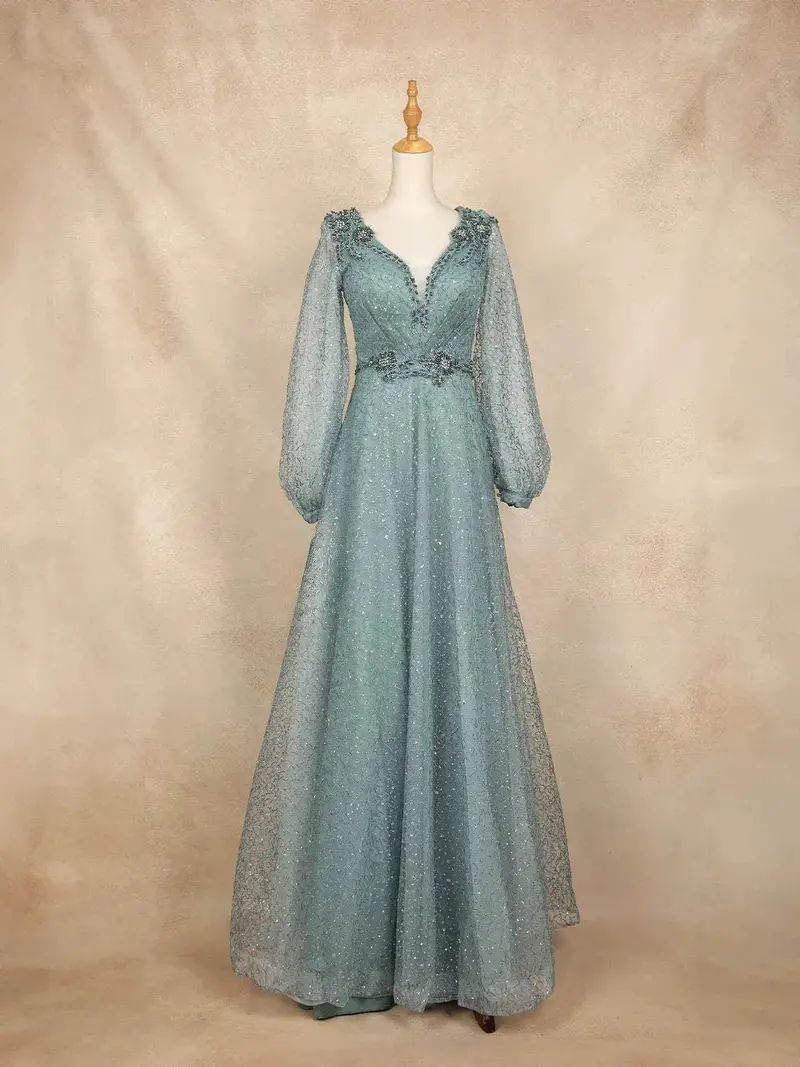 Teal Blue Net With Floral Embroidery And Bishop Sleeves Gown 1