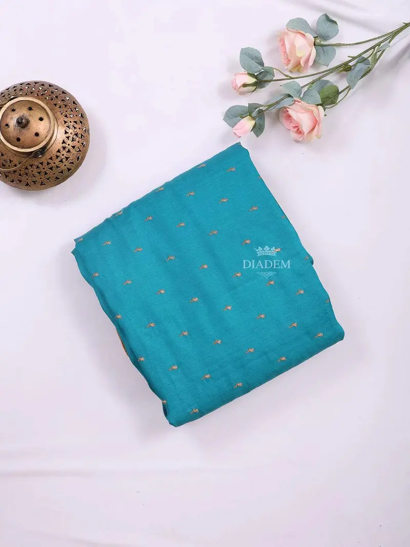 Teal Blue Semi Tussar Silk Saree With Small Flower Motif On The Body And Without Border 1