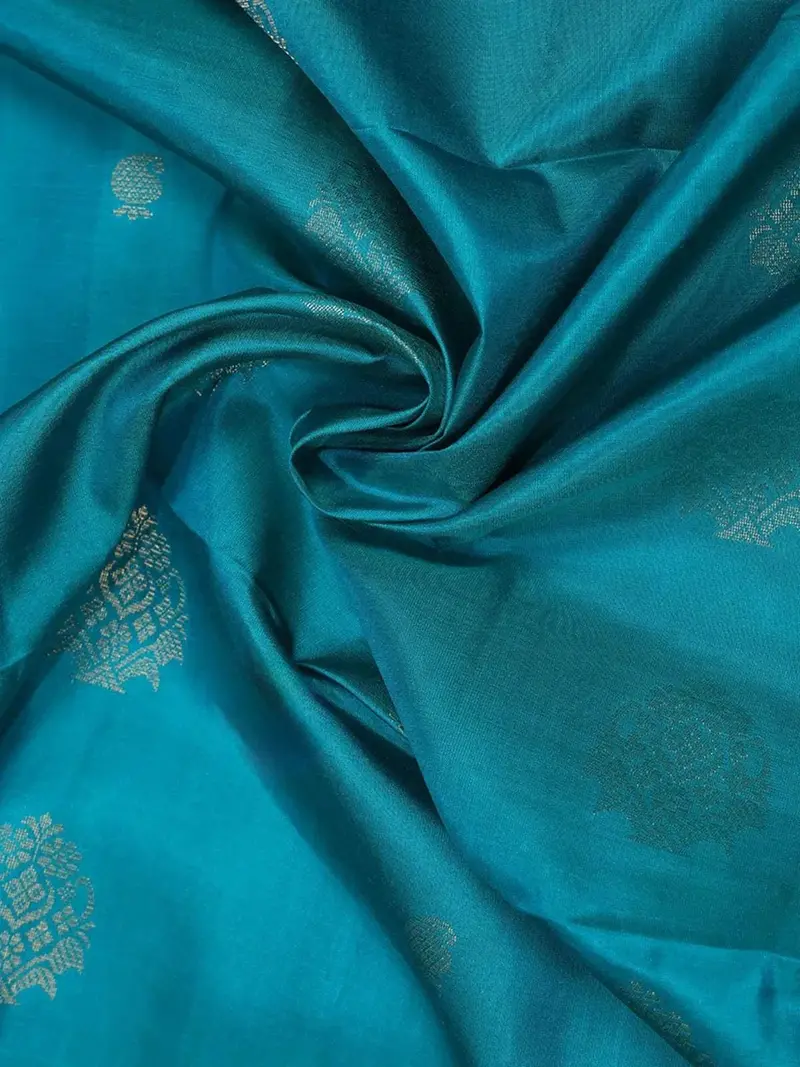 Teal Blue Soft Silk Saree With Floral And Paisley Design On The Body With Contrast Border 2