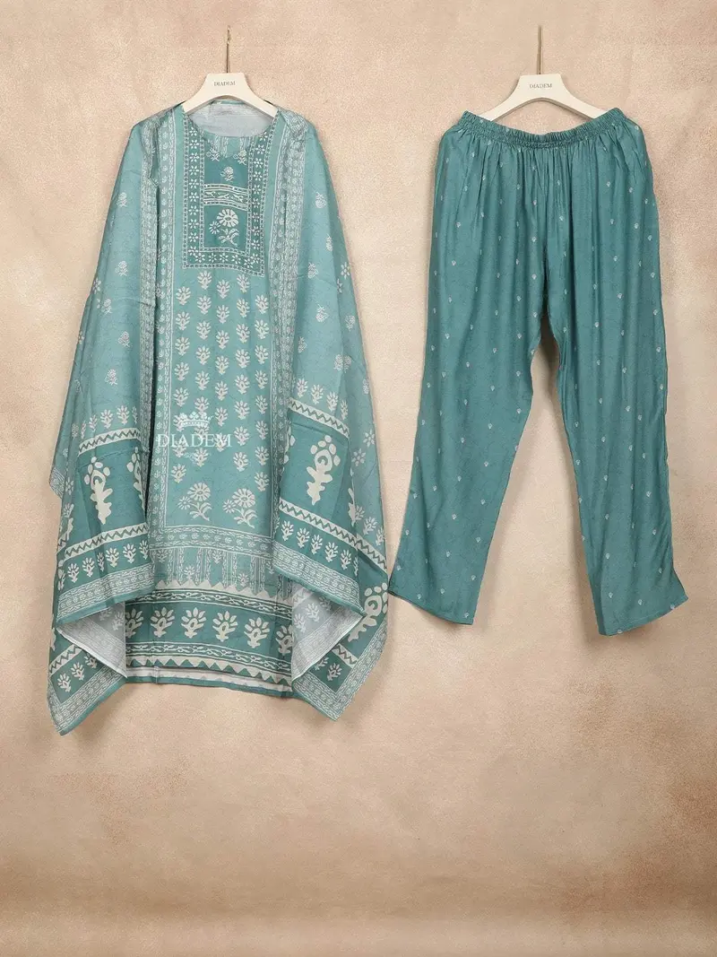Teal Blue Straight Cut Salwar Suit Adorned With Beads And Floral Design And Paired With Dupatta 1