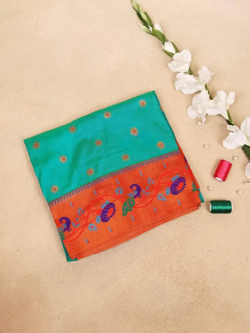 Teal Green Banarasi Saree With Dots Floral Design On The Body And Designed Border 1