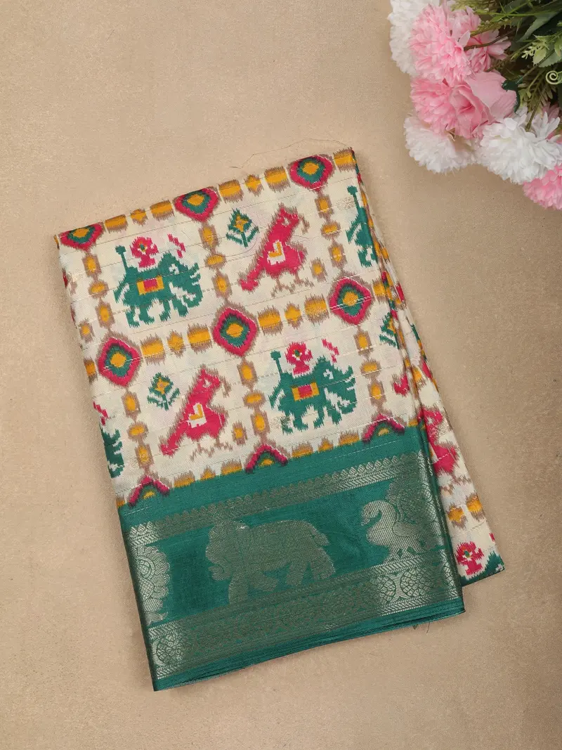 Teal Green Geometric Ikat-Inspired Design Crepe Saree With Ornamental Zari Woven Border 1