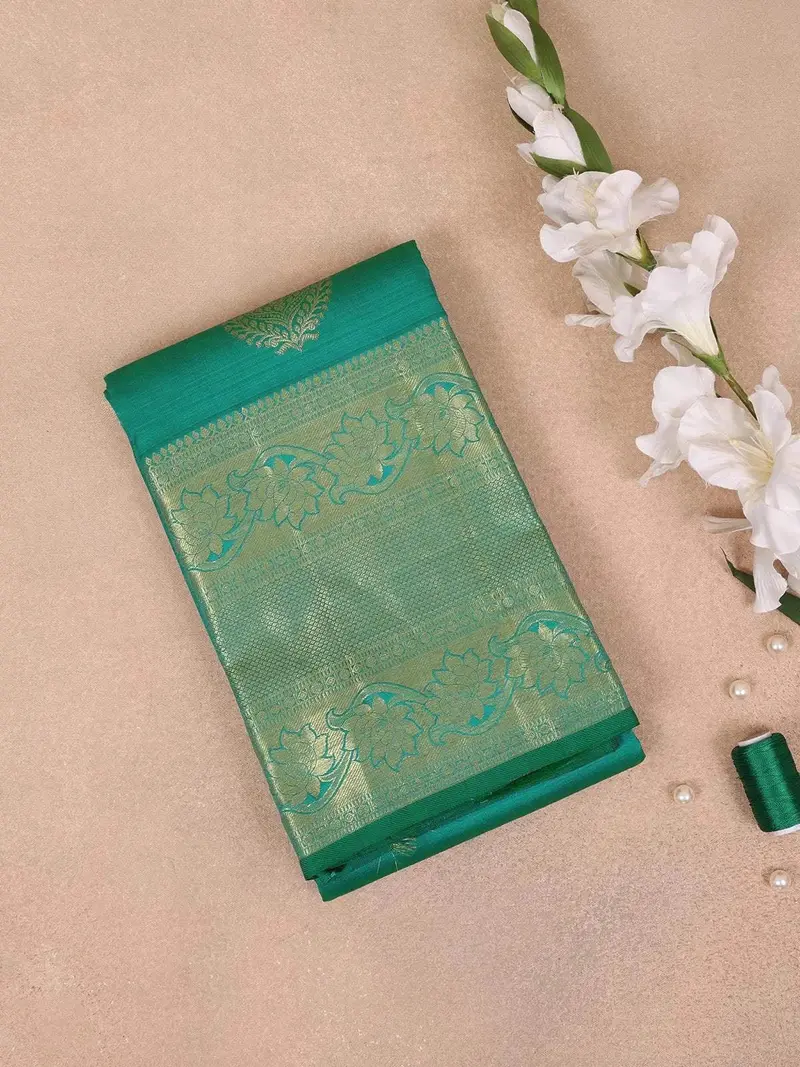 Teal Green Pure Kanchipuram Bridal Silk Saree With Flower Motifs On The Body With Zari Border 1